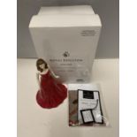 A BOXED ROYAL DOULTON GEMSTONES FIGURINE WITH A GENUINE SWAROVSKI CRYSTAL - JANUARY - GARNET