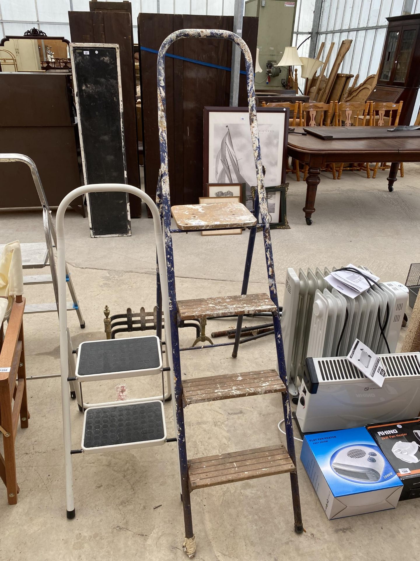 A TUBULAR METAL THREE RUNG STEP LADDER AND A FURTHER SMALL TWO RUNG STEP LADDER