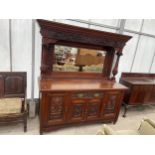 A VICTORIAN MAHOGANY MIRROR-BACK SIDEBOARD WITH HEAVILY CARVED DOOR PANELS AND DRAWER TO THE BASE