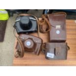 FOUR VINTAGE CAMERA CASES