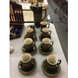 AN OLIVE GREEN HIGHLY GLAZED PORTUGESE COFFEE SET, TO INCLUDE SIX CUPS AND SAUCERS, SUGAR BOWL,