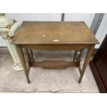 AN EARLY 20TH CENTURY OAK TWO TIER CENTRE TABLE WITH PAINTED FLORAL DECORATION TO THE TOP