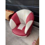 A PCL COLLECTION RELAXATION CHILDS SWIVEL CHAIR IN RED AND WHITE