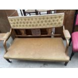 AN EDWARDIAN SATINWOOD AND INLAID PARLOUR SETTEE WITH CARVED CENTRAL PANEL