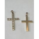 TWO 9 CARAT GOLD CROSSES MARKED 375 ONE WITH CUBIC ZIRCONIAS GROSS WEIGHT 11.2 GRAMS