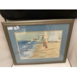 A FRAMED PICTURE OF A BEACH SCENE