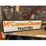 A McCORMICK-DEERING TRACTORS ILLUMINATED SIGN SIZE 85CM X 24.5CM