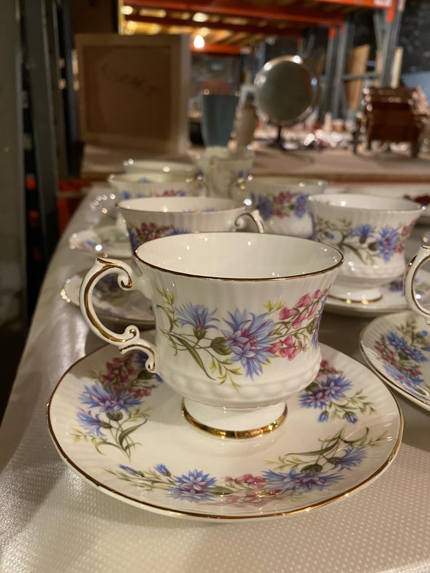 A BONE CHINA PART TEA SET COMPRISING OF SIX CUPS AND SAUCERS, SANDWICH PLATE, MILK JUG AND SUGAR - Image 3 of 4