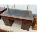 A REPRODUCTION MAHOGANY KNEEHOLE DESK, 54 X 30" WITH INSET LEATHER TOP