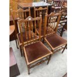 A SET OF FOUR MODERN SPINDLE BACK DINING CHAIRS