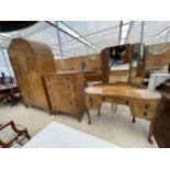 A MID 20TH CENTURY WALNUT BEDROOM SUITE VIZ WARDROBE, CHEST OF DRAWERS AND KIDNEY SHAPED DRESSING