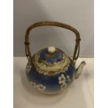 AN OLD ORIENTAL STYLE TEAPOT (SPOUT A/F)