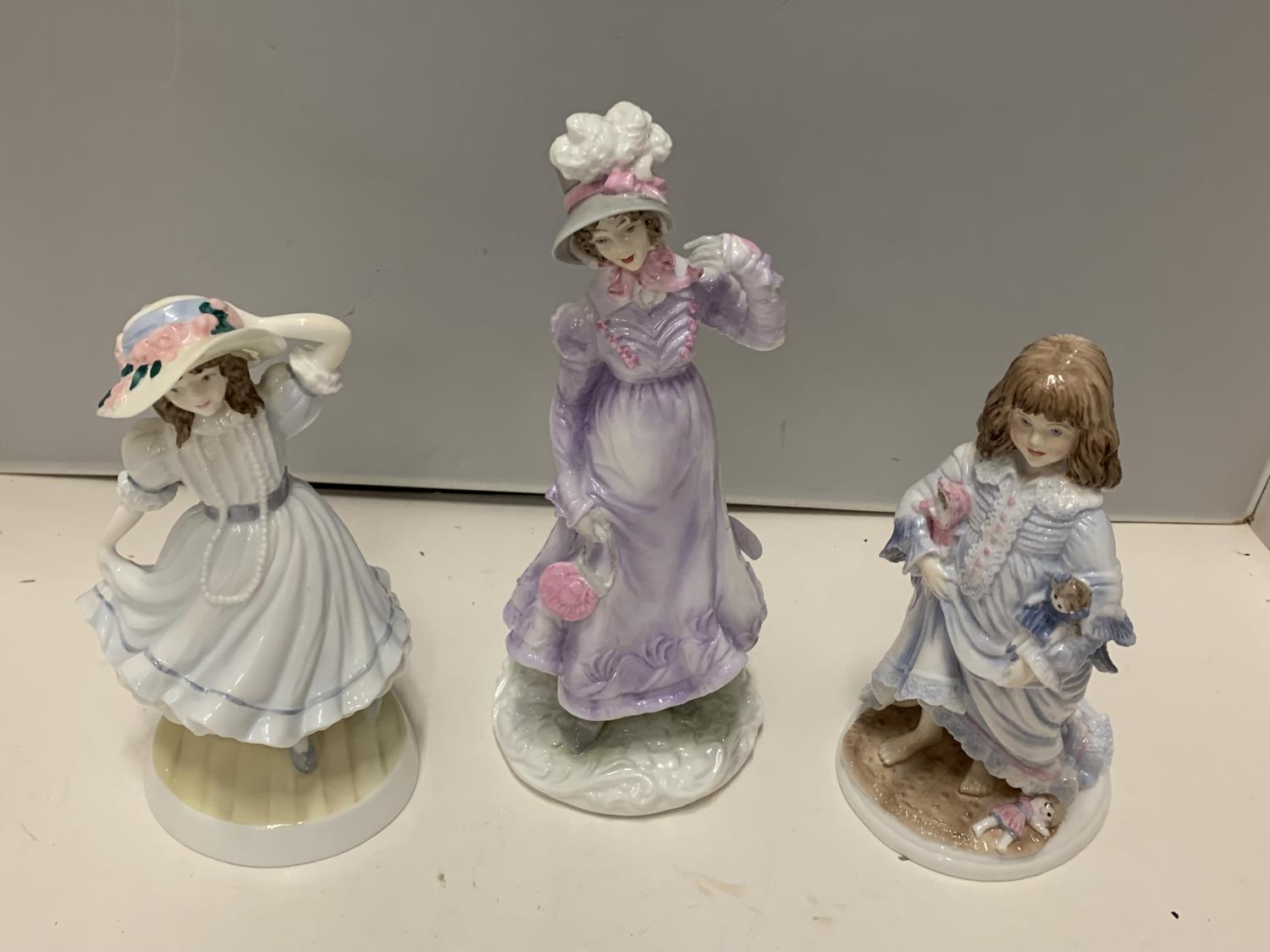 THREE ROYAL WORCESTER FIGURINES TO INCLUDE GRANDMAS BONNET, LULLABY AND A LIMITED EDITION WALKING