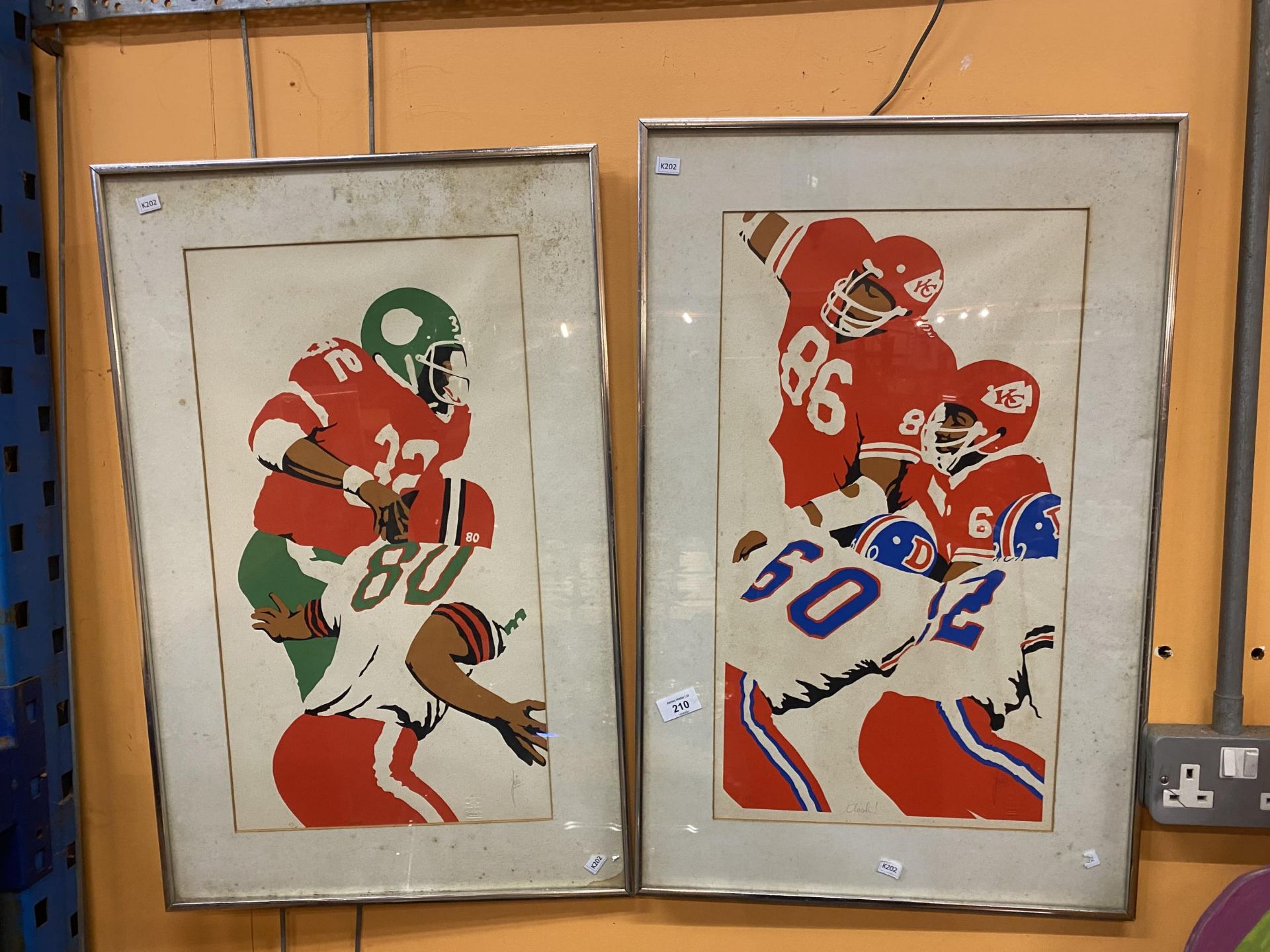 TWO FRAMED SIGNED PRINTS OF AMERICAN FOOTBALL PLAYERS. FOXING TO BOTH