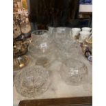 AN AMOUNT OF HEAVY CUT GLASS CRYSTAL BOWLS OF VARIOUS SIZES