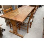 A MODERN PINE DINING TABLE AND THREE CHAIRS