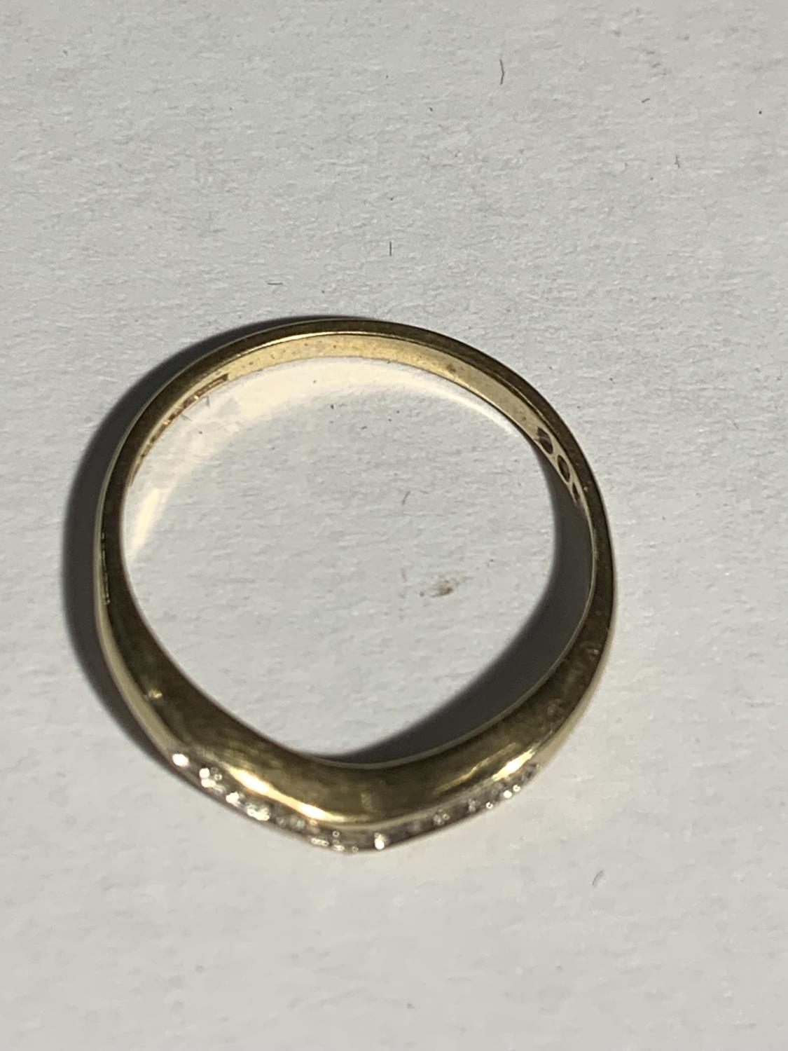 A 9 CARAT GOLD RING IN A WISHBONE DESIGN WITH CLEAR STONES POSSIBLY DIAMONDS SIZE N/O GROSS WEIGHT - Image 2 of 3