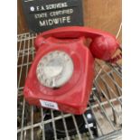 A VINTAGE RED 1960/70s RETRO TELEPHONE