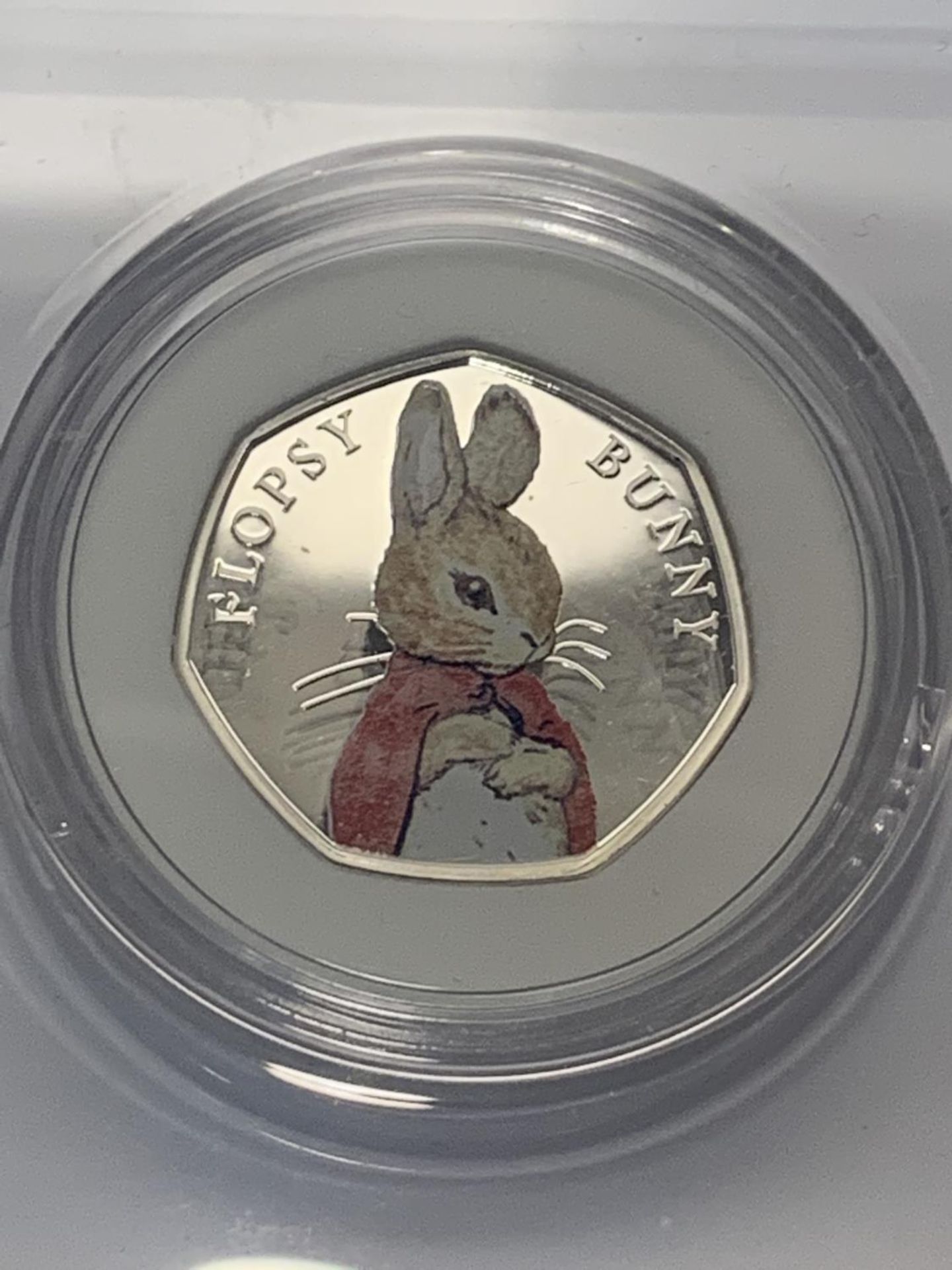 A UK 2018 BEATRIX POTTER FLOPSY BUNNY 50P SILVER PROOF COIN WITH CERTIFICATE OF AUTHENTICITY - Image 2 of 3