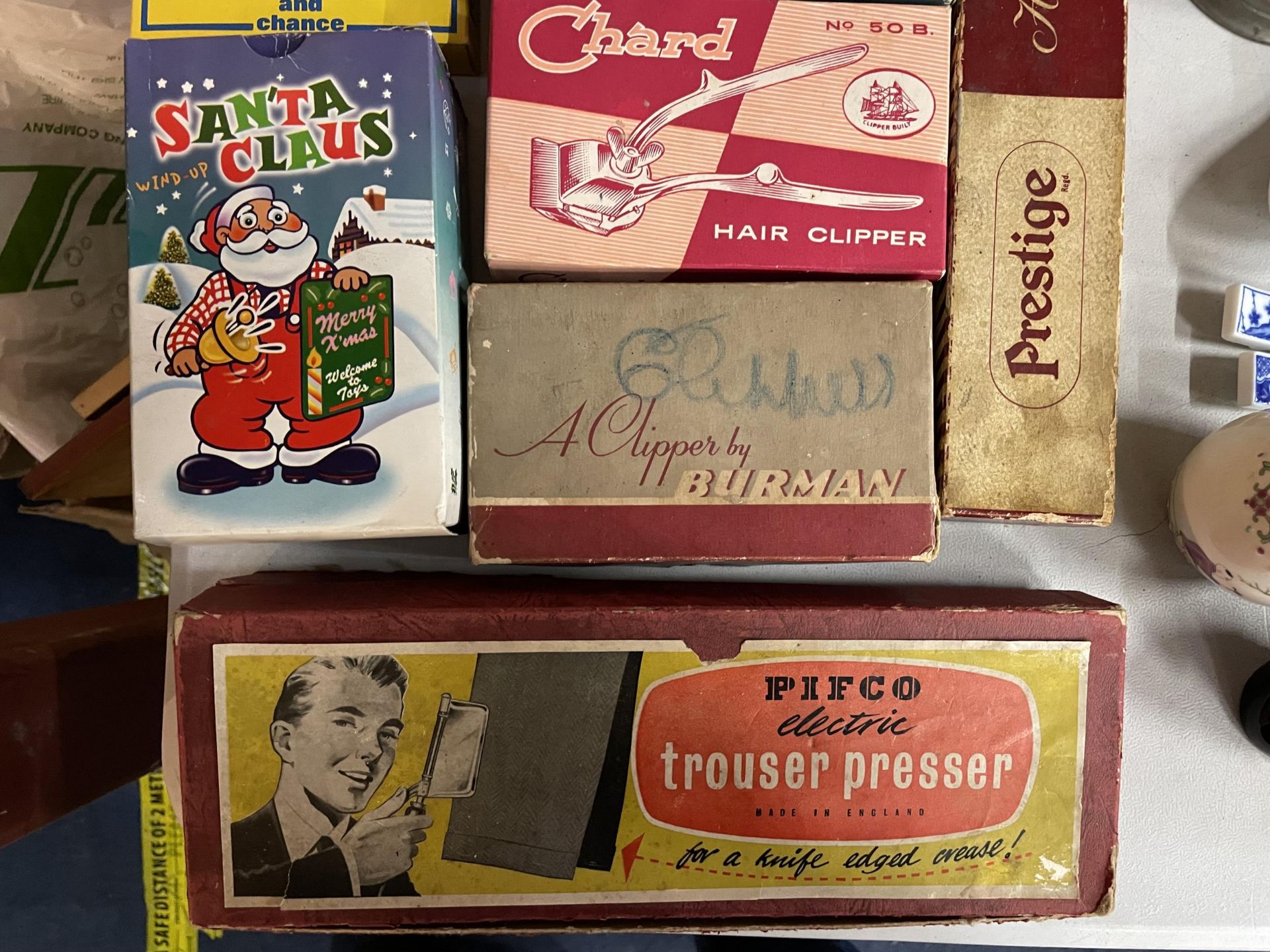 VARIOUS BOXED VINTAGE ITEMS TO INCLUDE HAIR CLIPPERS, TROUSER PRESS, BREAST RELIEVERS ETC - Image 2 of 6