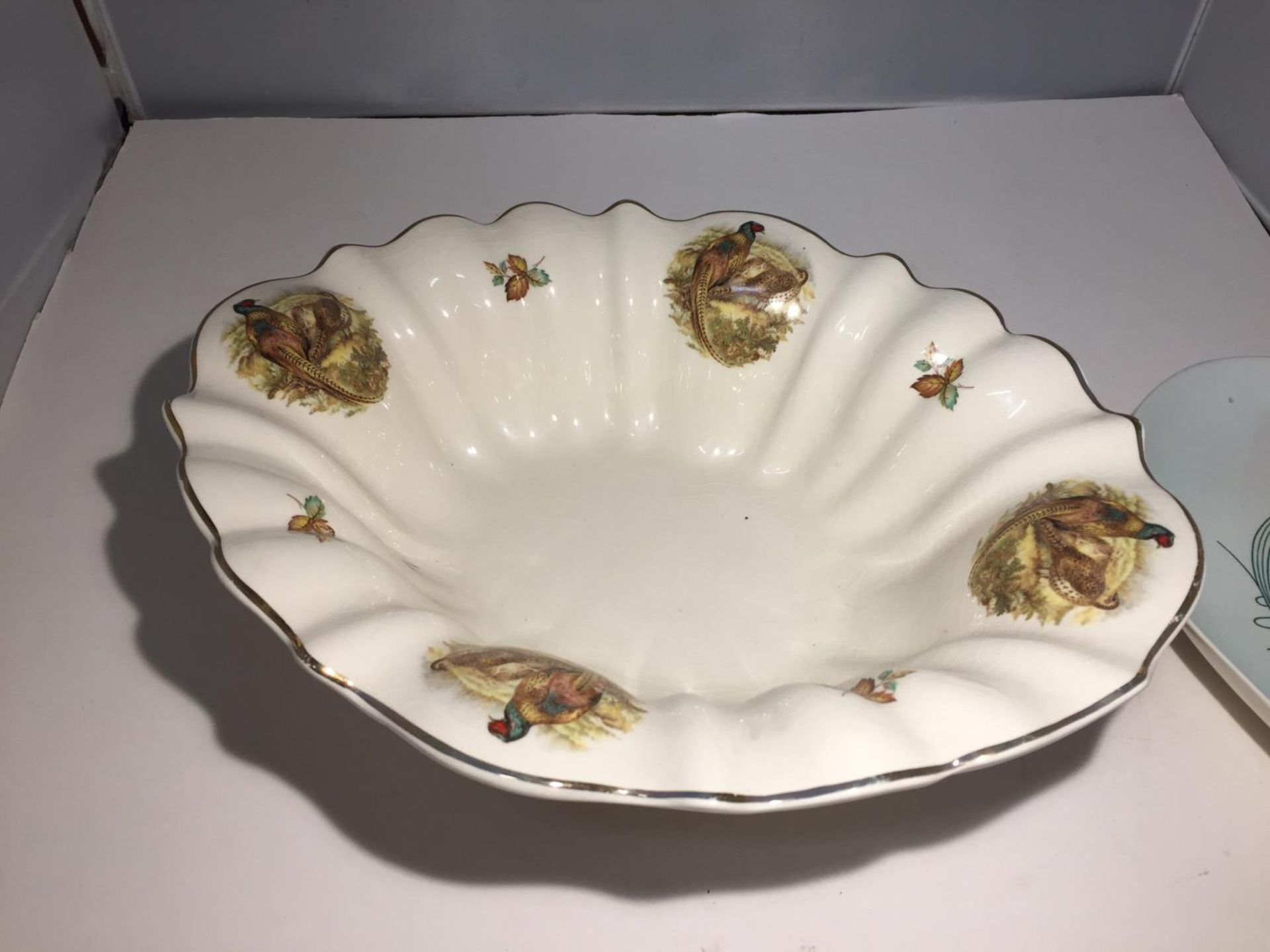 A STAFFORDSHIRE IRONSTONE DISH IN A PHEASANT DESIGN AND A CARLTONWARE SERVING DISH - Image 3 of 4