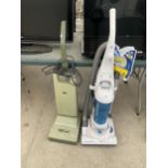 AN ELECTROLUX VACUUM AND A FURTHER HOOVER VACUUM CLEANER
