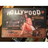 A TIN HOLLYWOOD DETECTIVE SIGN