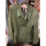 A MILITARY STYLE KHAKI JACKET