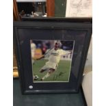 A FRAMED SIGNED PICTURE OF DAVID BECKHAM