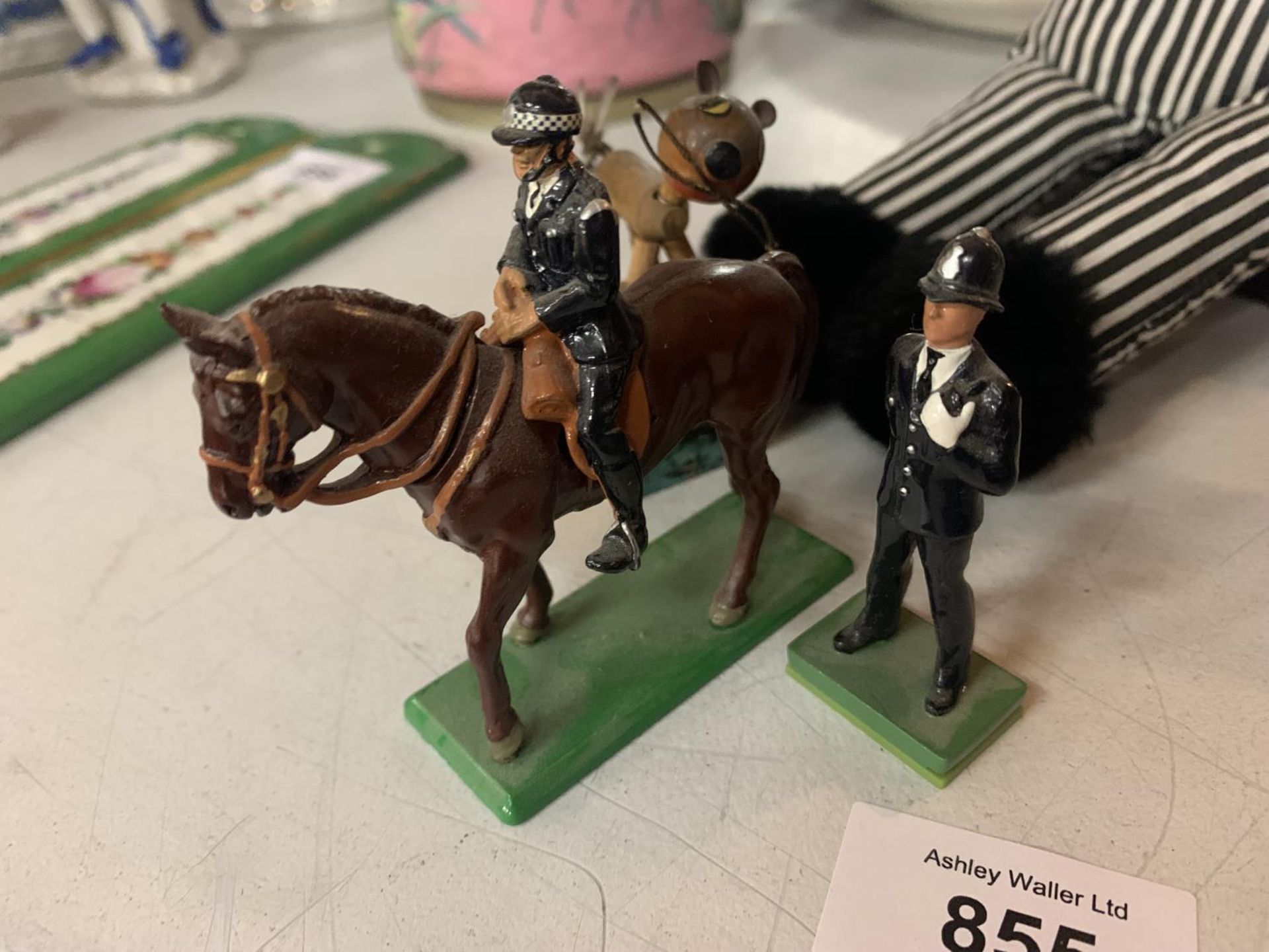 A ROBINSONS CHARACTER SOFT TOY AND TWO METAL FIGURES OF A POLICE MAN AND A POLICEMAN ON HORSEBACK - Image 2 of 3