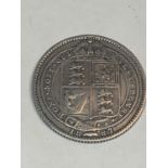 A VICTORIAN SILVER SHILLING 1887