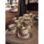 A QUANTITY OF ELIZABETHAN CHINA TO INCLUDE CUPS, SAUCERS, CREAM JUG AND SUGAR BOWL