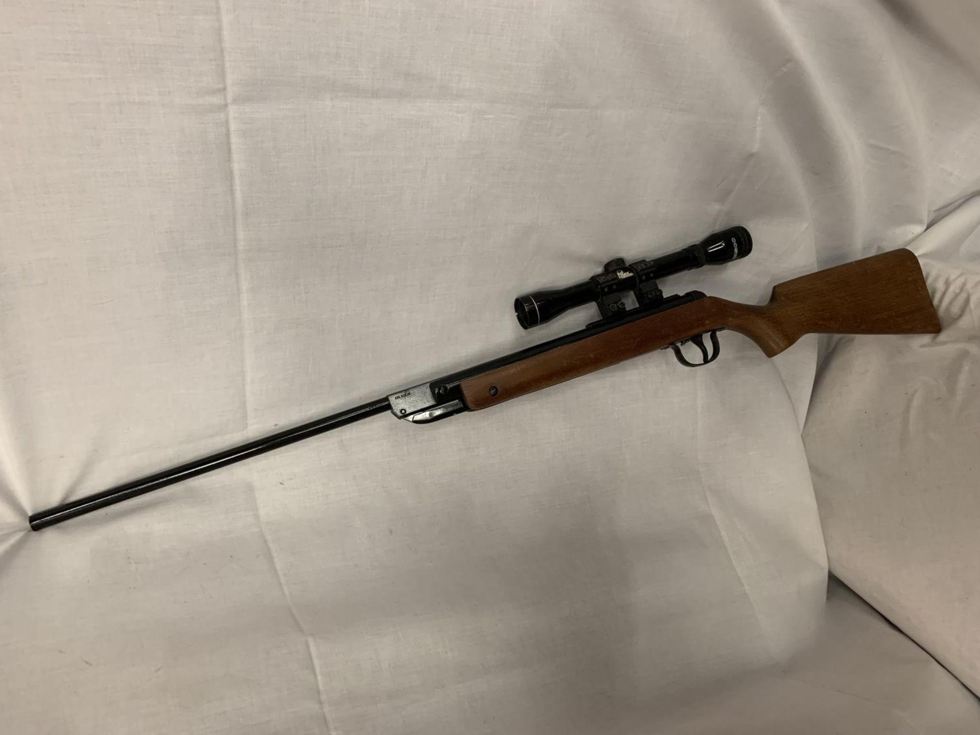 A DIANA AIR RIFLE WITH SCOPE