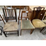 A RUSH SEATED COUNTRY CHAIR, AN EDWARDIAN DINING CHAIR AND A MAHOGANY ROPE BACK CHAIR