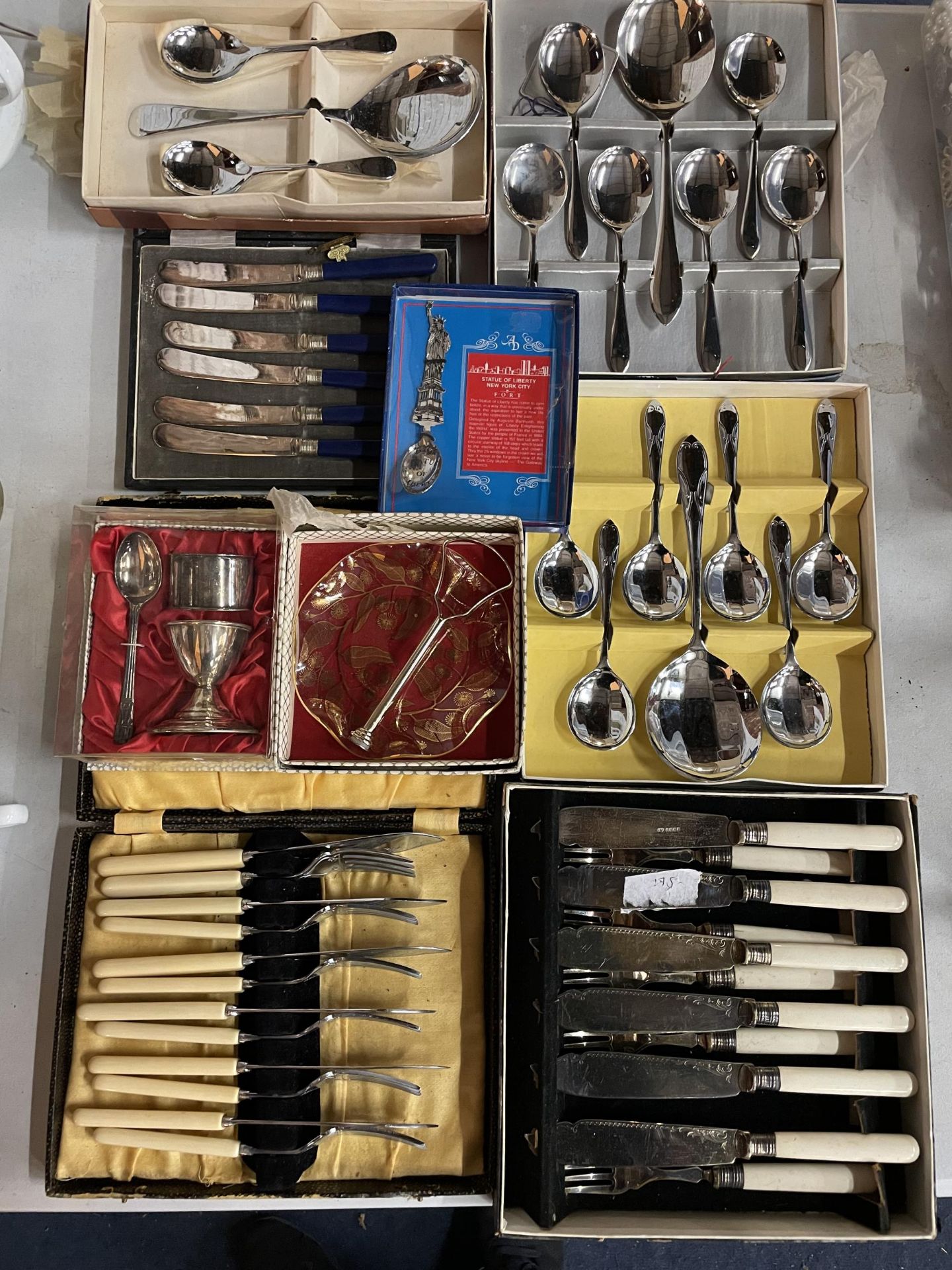 SIX BOXES OF FLATWARE TO INCLUDE KNIVES, FORKS, SPOONS ETC, PLUS A BOXED EGGCUP, NAPKIN RING SET