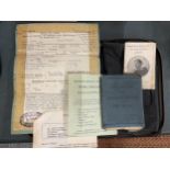 A ZIPPED WALLET CONTAINING A RAF AIRMAN'S SERVICE AND PAYBOOK AND DISCHARGE PAPERS
