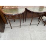A PAIR OF DEMI-LUNE HALL TABLES WITH INSET LEATHER TOPS 32" WIDE EACH