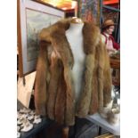 A SACKS AND BRENDLOR 'THE FURRIERS' FOX FUR COAT