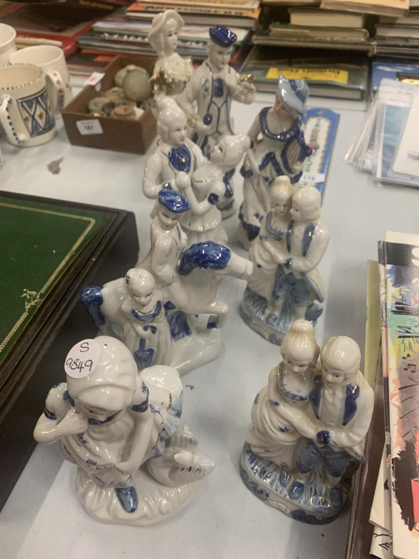 EIGHT CERAMIC FIGURE GROUPS IN THE STAFFORDSHIRE STYLE