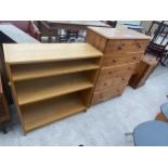 A MODERN PINE CHEST OF TWO SHORT AND FOUR LONG DRWERS 32.5" WIDE AND AN OAK EFFECT OPEN BOOKCASE