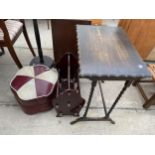 A 1960s POUFFE, A MAGAZINE RACK AND AN OAK OCCASIONAL TABLE ON BARLEY TWIST SUPPORTS