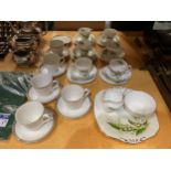A PART TEASET BY ADDERLEY WITH A PATTERN OF SNOWDROPS AND CUPS AND SAUCERS BY ROYAL DOULTON