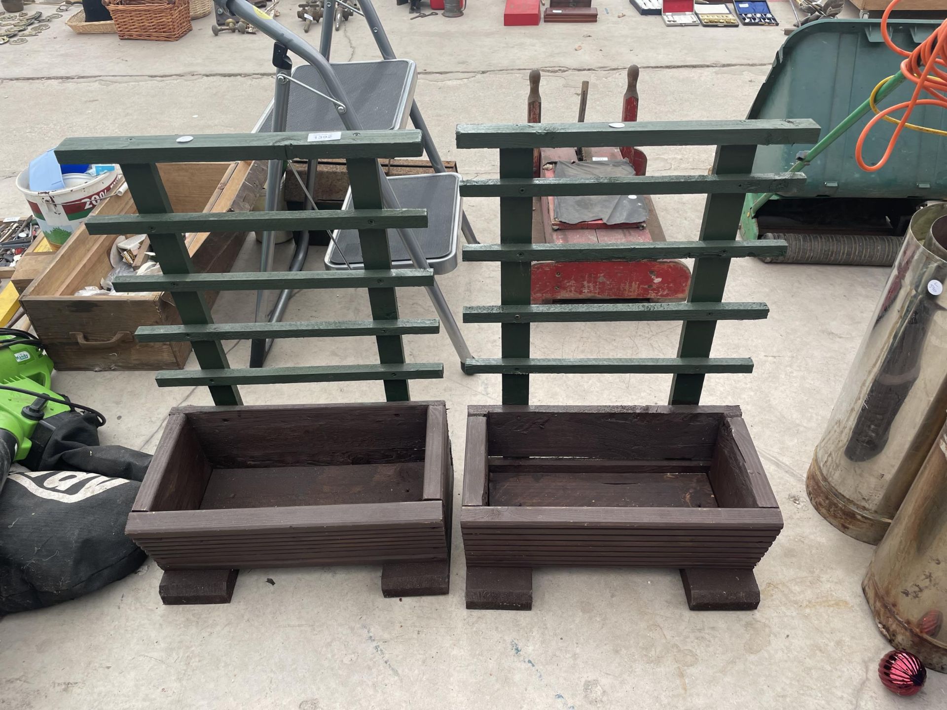 A PAIR OF PAINTED WOODEN PLANTER TROUGHS