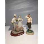 TWO FIGURINES, ONE DEPICTING A GOLFER MAJOR BUMBLE, BY CHRISTOPHER ROBIN FINE BONE CHINA, THE