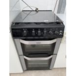 A BLACK BELLING FREESTANDING GAS COOKER AND HOB