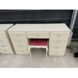 A MODERN CREAM & GILT DRESSING TABLE AND STOOL