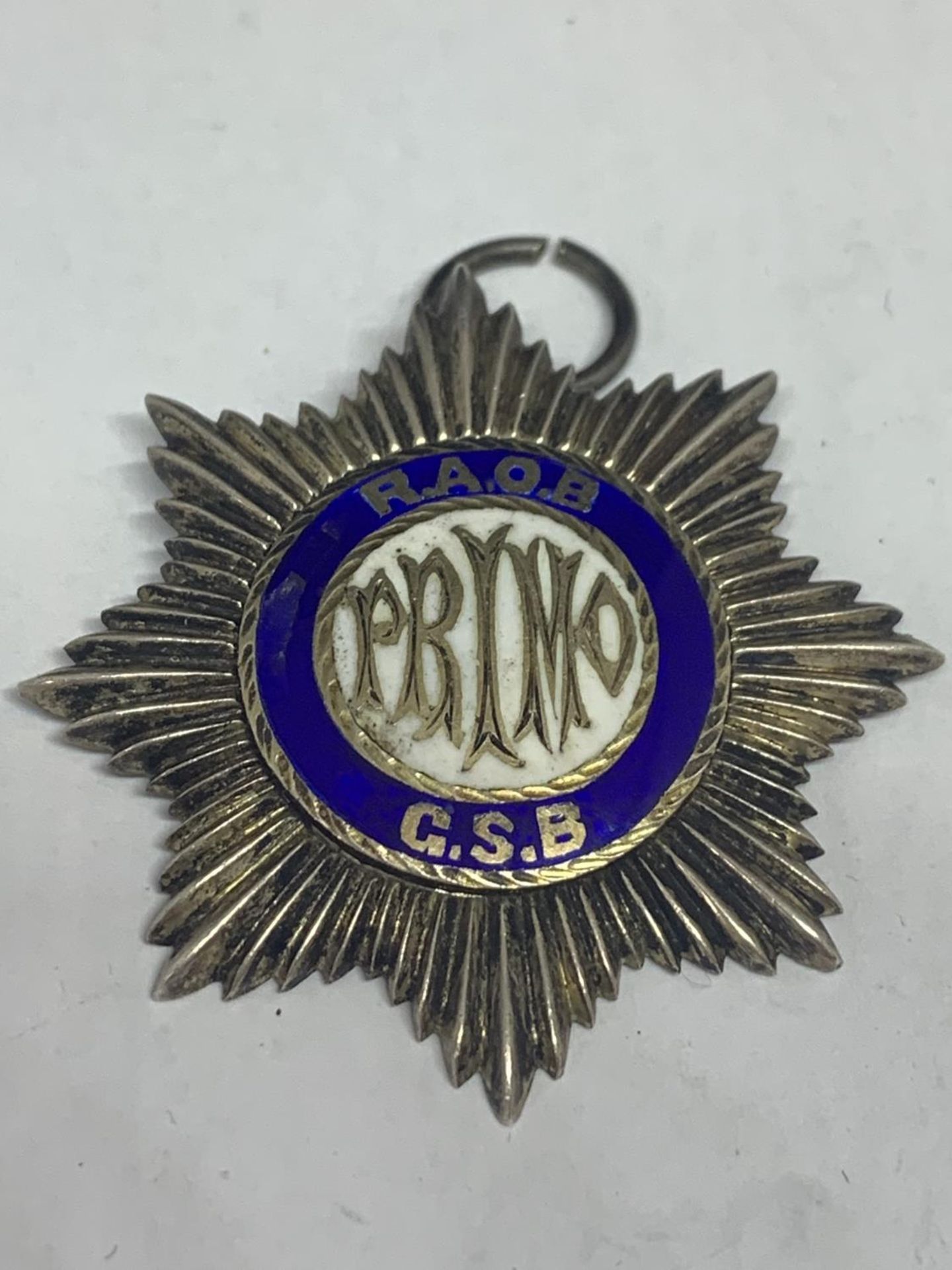 AN 1897 SILVER AND ENAMEL RAOB MEDAL