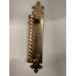 A VERY HEAVY VINTAGE BRASS DOOR HANDLE