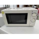A WHITE GEORGE HOME MICROWAVE OVEN