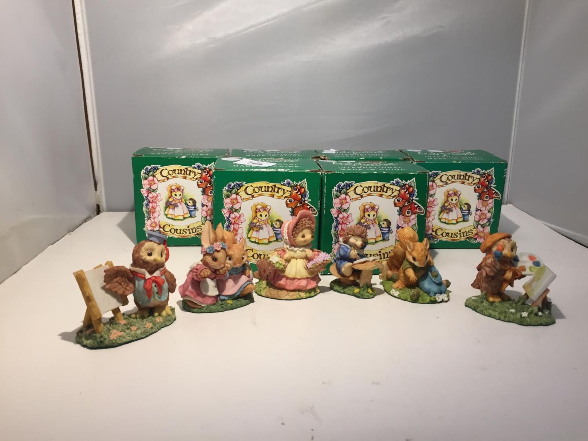 SIX BESWICK COUNTRY COUSINS FIGURES WITH BOXES